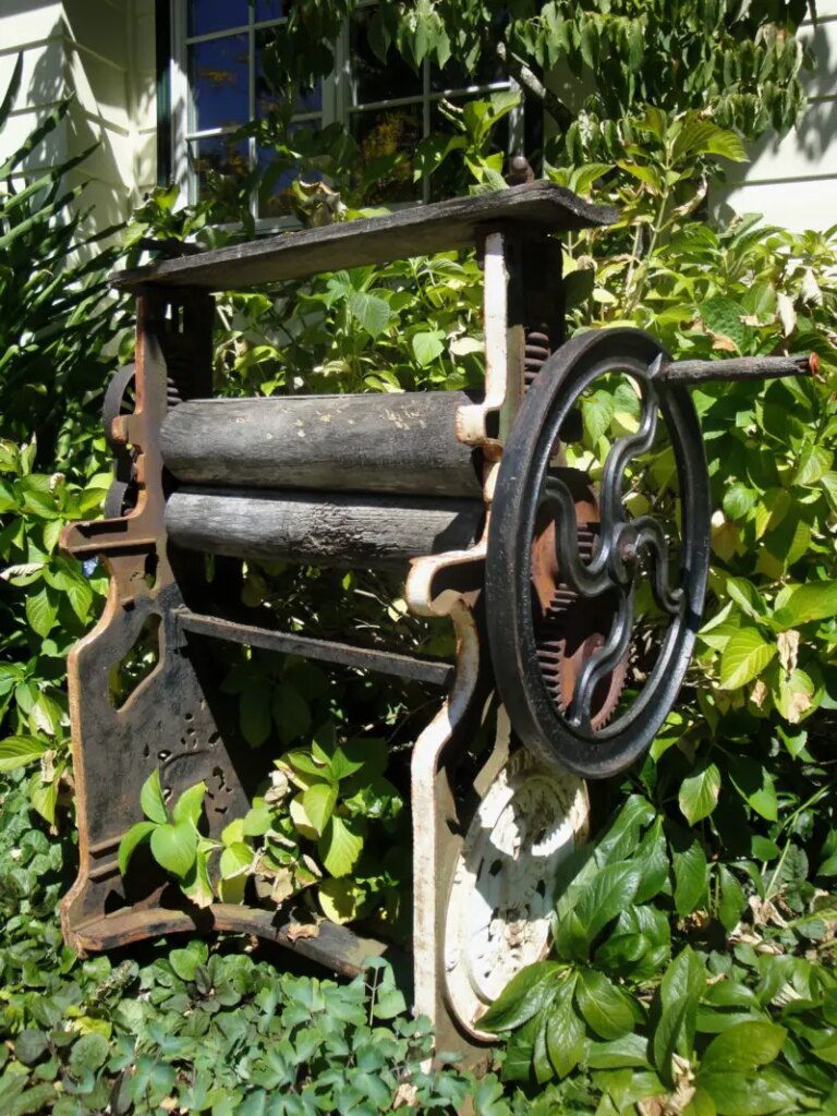 Our-Antique-Laundry-Press-as-Garden-Decor